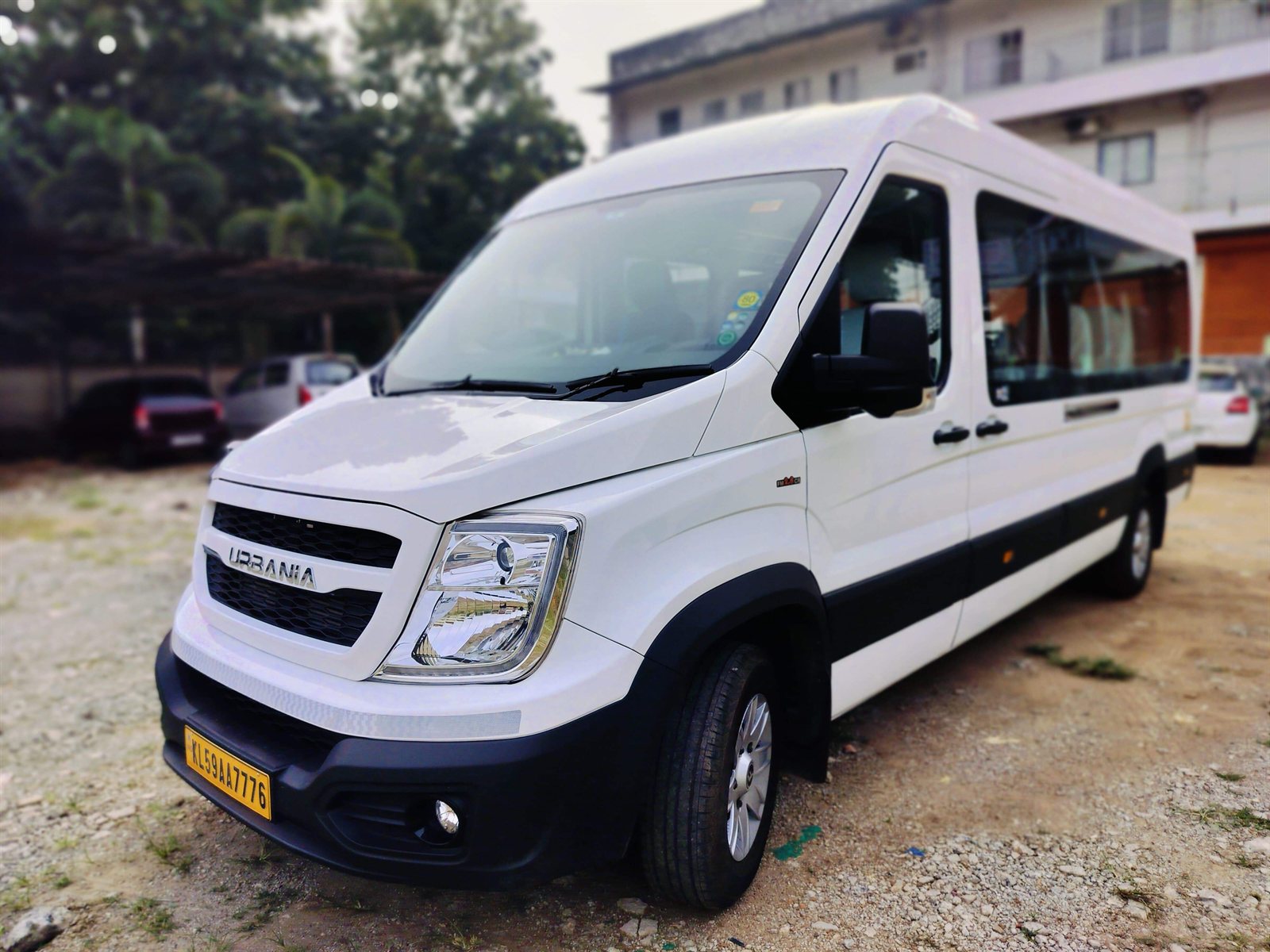 White Force Urbania van parked at the Kerala Taxi Cab yard in Kochi